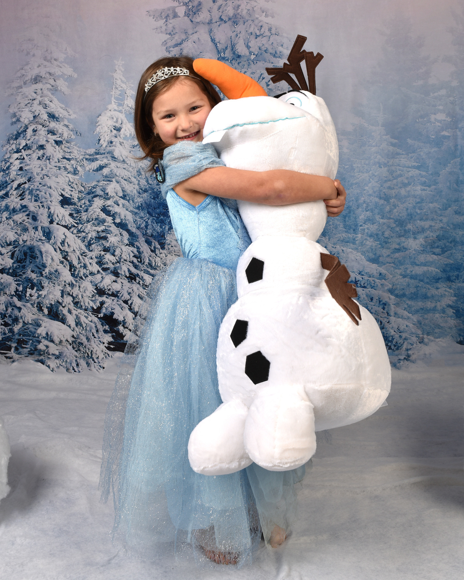 Become Elsa from Frozen and have your photo taken with Olaf in our Stafford studio